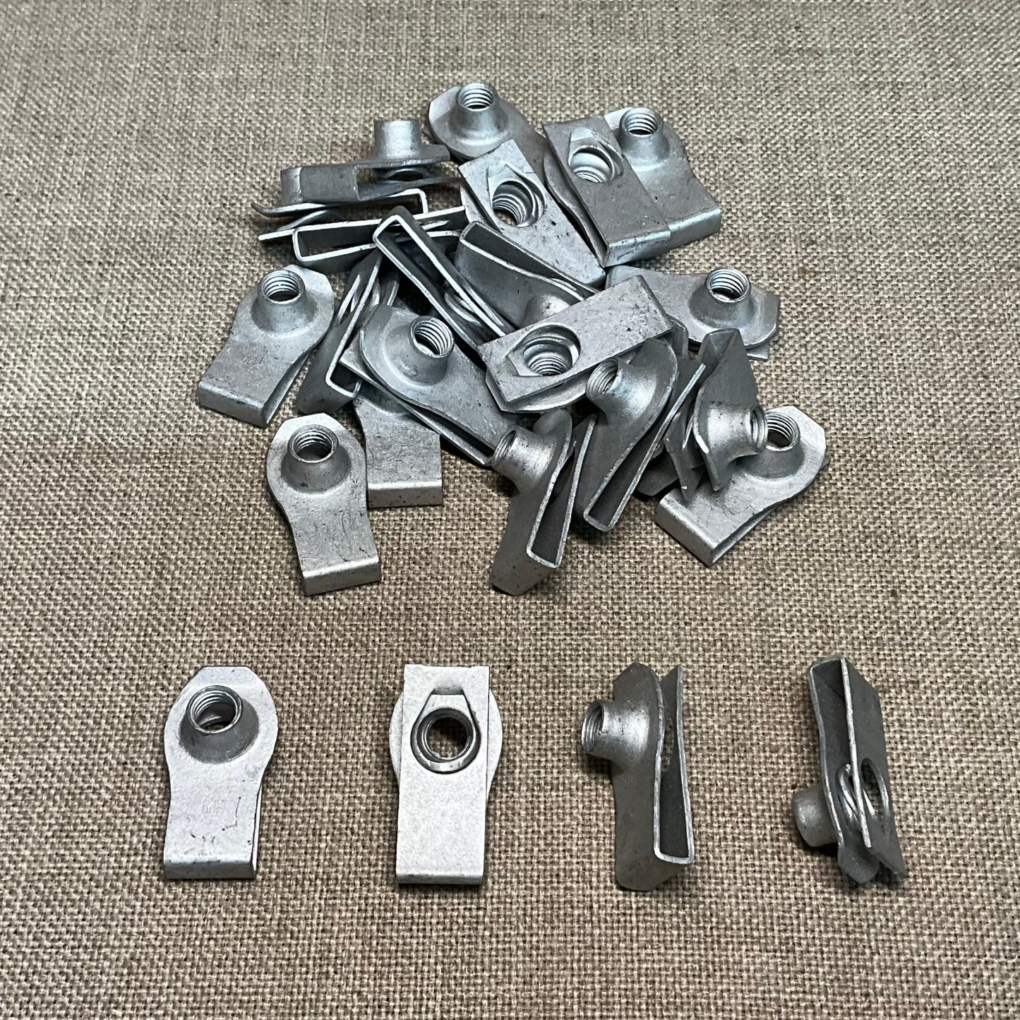 25 Extruded "U" Nuts (Foldover Nuts) Auveco 18339 GM: 11500663 Ford: N623344-S2