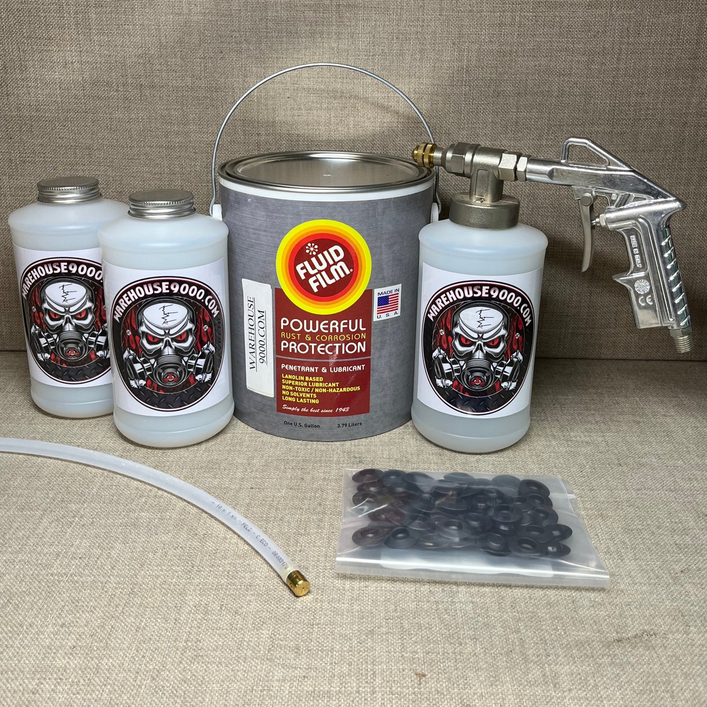 1 Gallon Fluid Film Amber, Pro Undercoating Spray Gun, 360* Spray Wand, 3 Quart Bottles, and 50 Rust Plugs