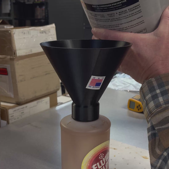 Pouring undercoating fluid into funnel bottle for spray gun application and automotive rust prevention